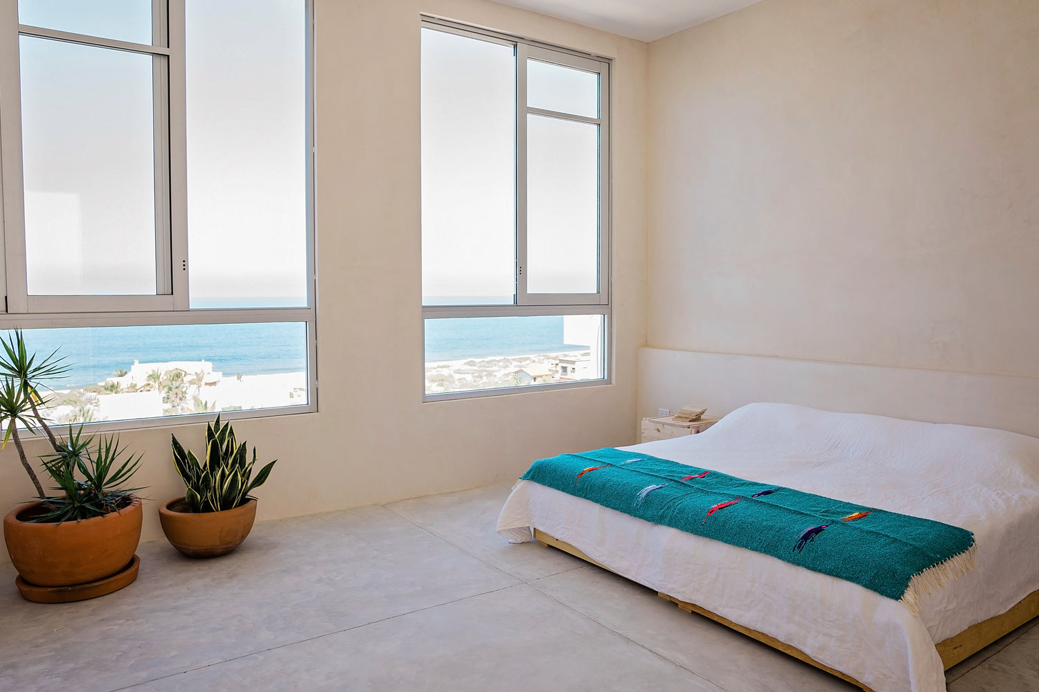 Image of bedroom accommodations for the soulside spring renewal and recovery yoga retreat in baja california, mexico