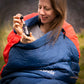 Image of women in sleeping bag using Soulside Sweet Slumber, an organic natural sleep aid that actually works made with premium plants to help you fall asleep and stay asleep.