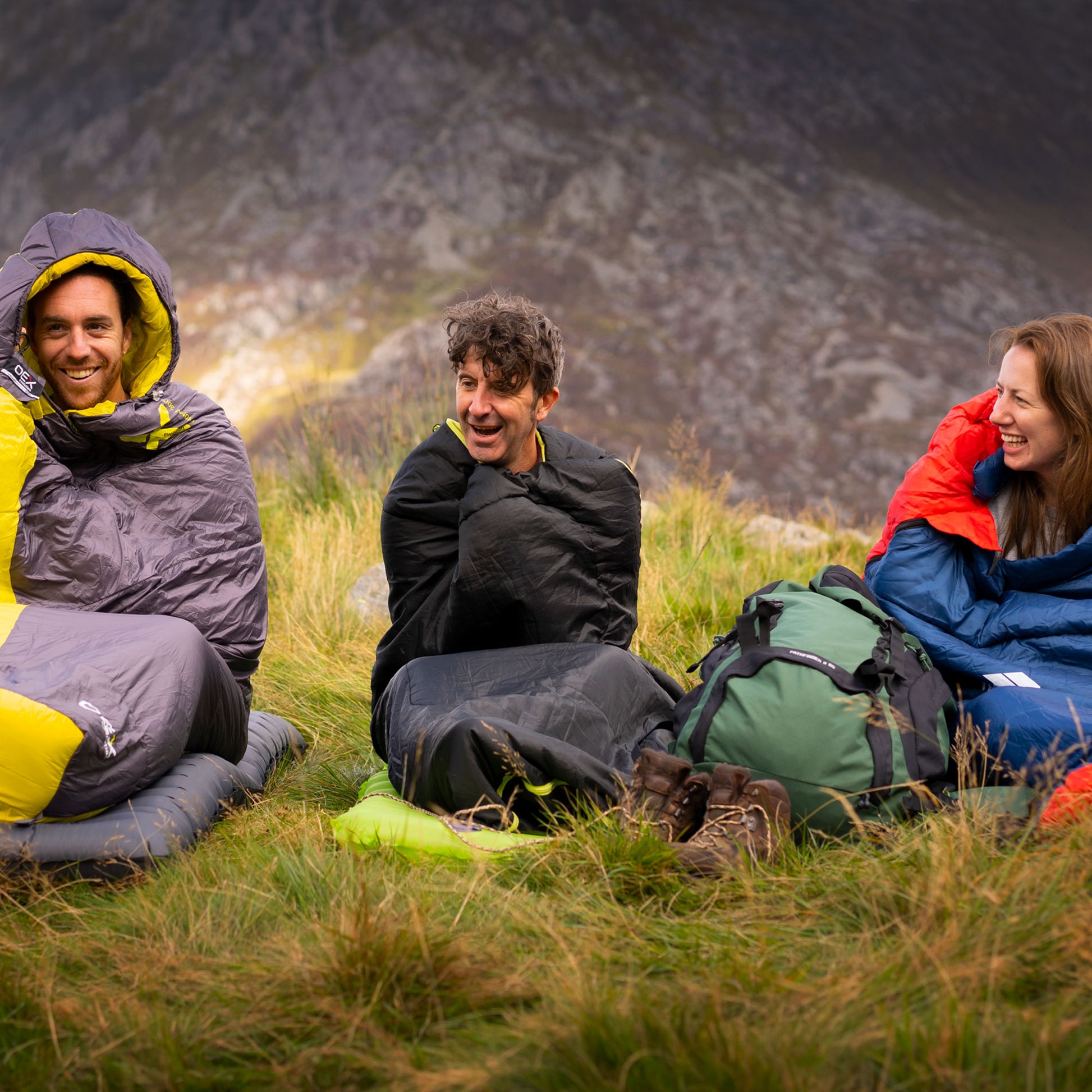 Image of backpackers and hikers in sleeping bags.